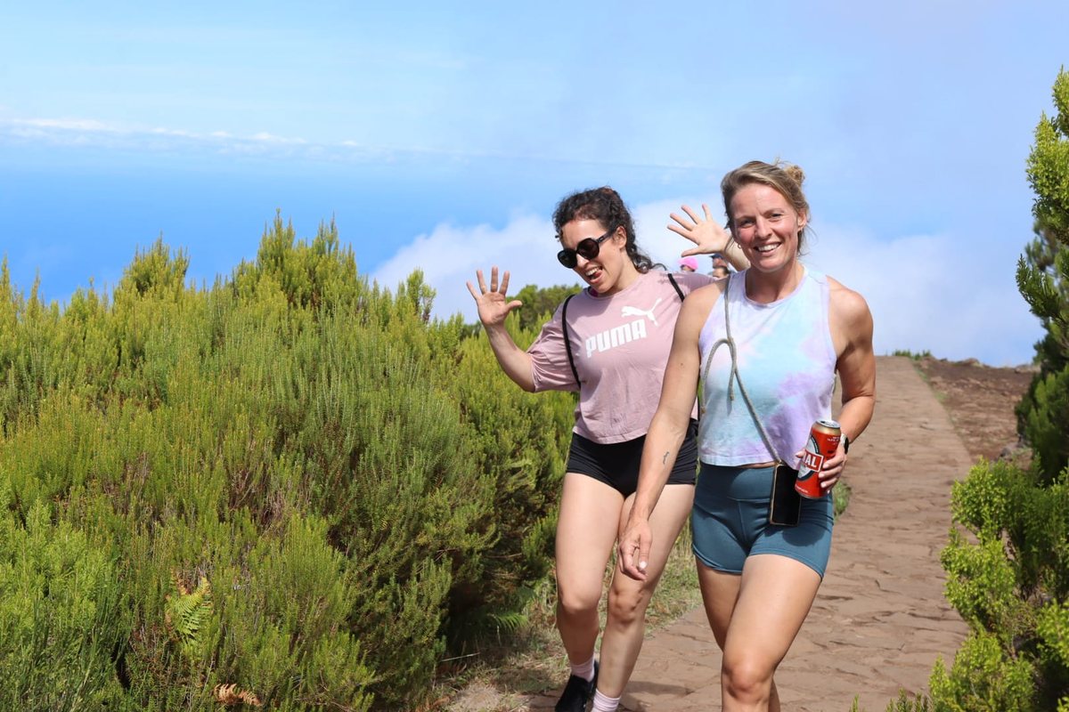 Hiking a ridge trail, waving to the camera